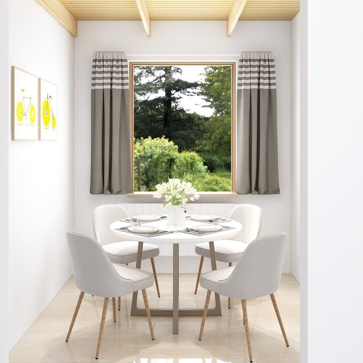 Dining nook under a sloping timber ceiling with a round table and a garden view