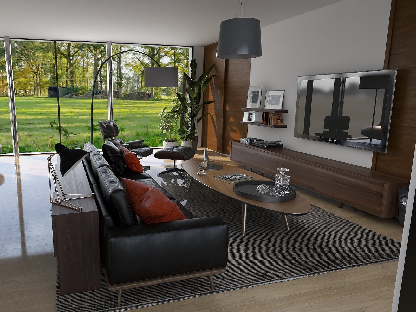 Living room with large garden windows, a black leather sofa and a low coffee table